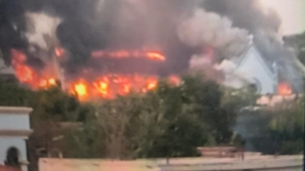MYA Video footage shows St Patrick's Cathedral on fire on 16 March. CREDIT RVA Kachin Facebook